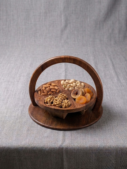 Wooden dry fruit tray with 4 compartments filled with almonds, pistachios, walnuts and dried apricots