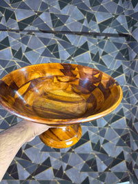 Close-up showing the wooden bowl interior and natural grain